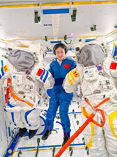 Liu Yang with spacesuits