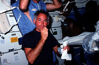 Mullane onboard Shuttle